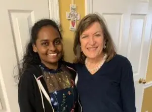 American woman with female Indian student