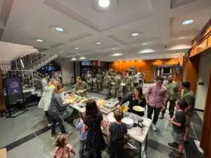 Campus ministry serves meal to military members in uniform